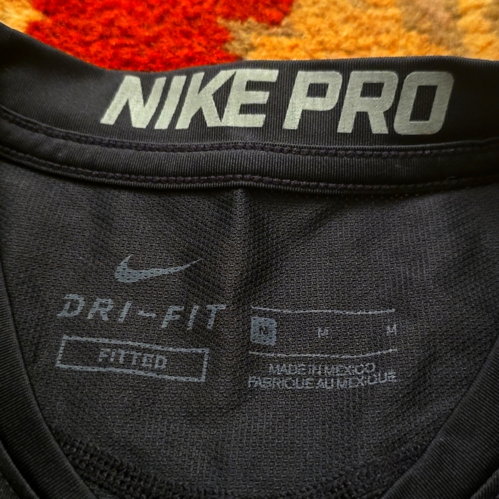 Nike pro brand new shirt for boys with tags size medium with gray words swoosh
